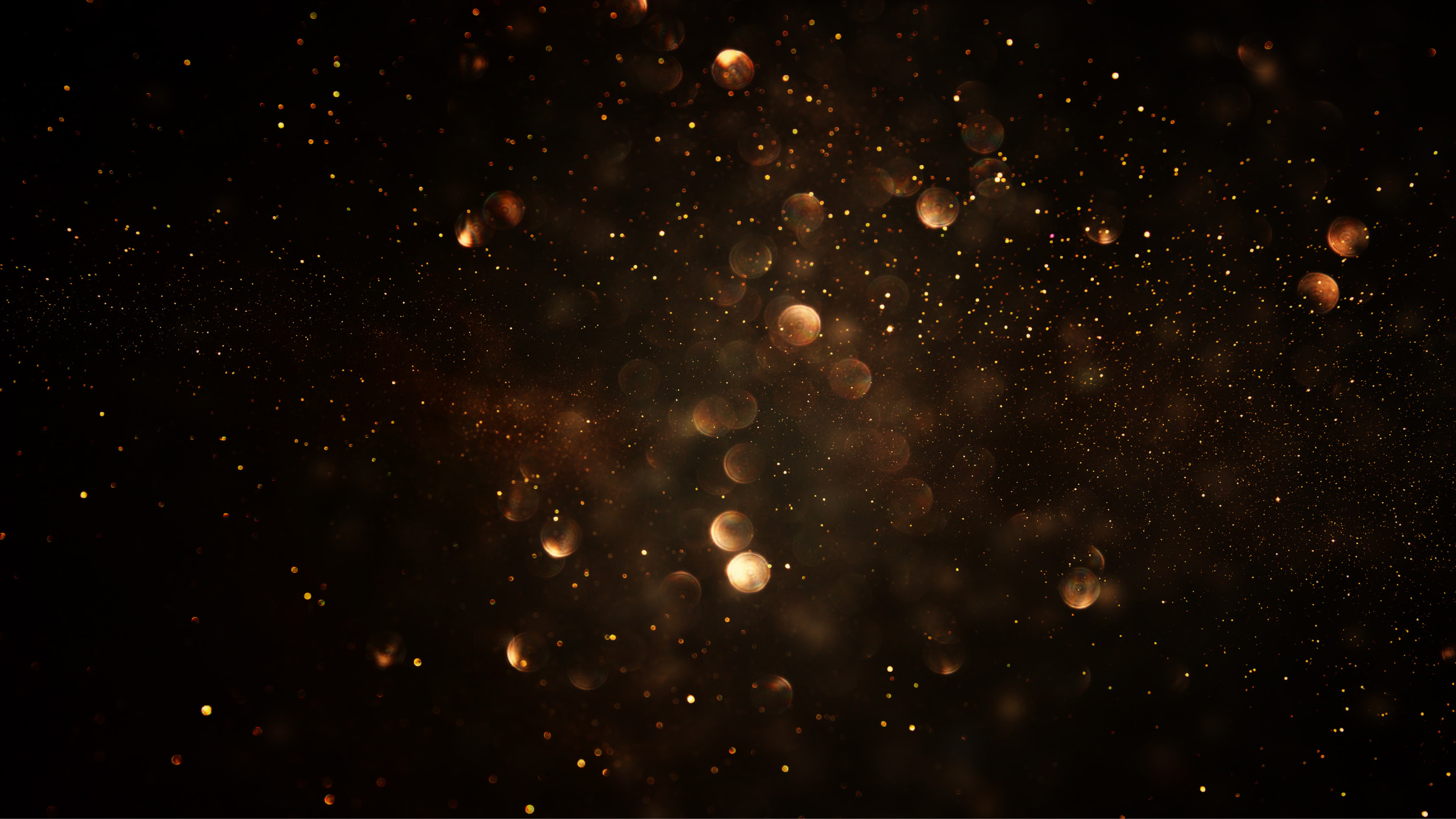Golden particles and light orbs float and shimmer against a dark background, creating a sparkling and ethereal atmosphere.

Description generated by AI